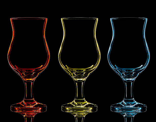 istock Silhouette of cocktail glass on black background 619963410