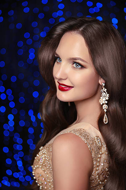 istock Makeup. Jewelry. Beautiful smiling woman model 619964036