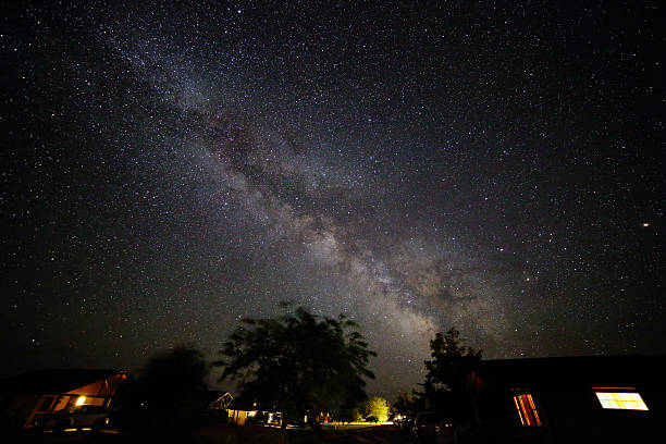 Milky Way Galaxy Shines Brightly Above a Cluster of Cabins