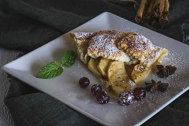 istock apple pie with fresh fruits on wooden table 619964394