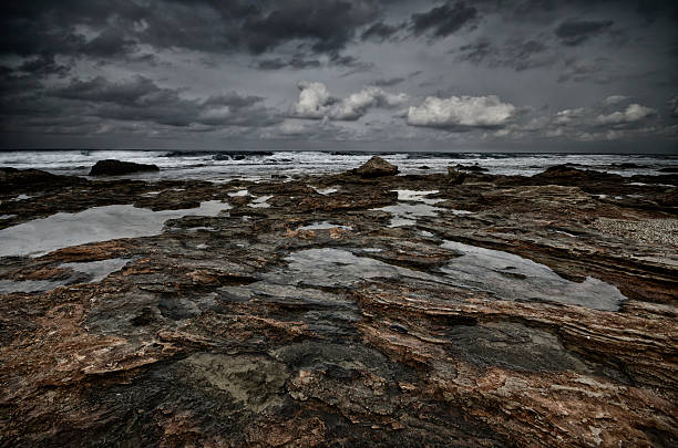 istock The dark side of a winter seascape. 619965426