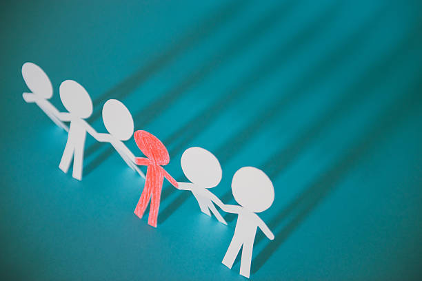 istock group of red and white paper people 619965892