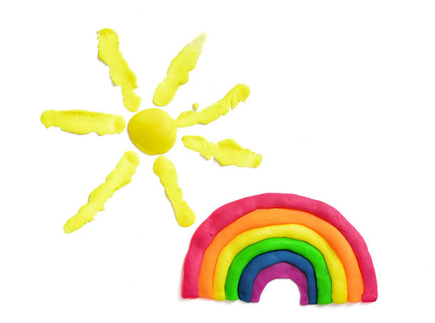 istock Rainbow and sun made of multicolored plasticine 619965936