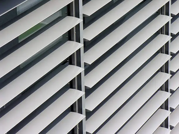opened metallic   window shutter at the  office building, innovation technique