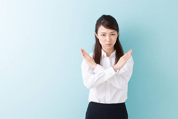 istock Businesswoman gesturing 619966966