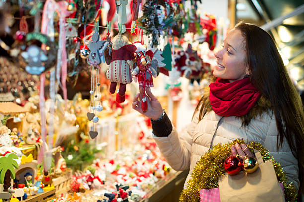 istock Female customer at the Christmas Fair 619967326
