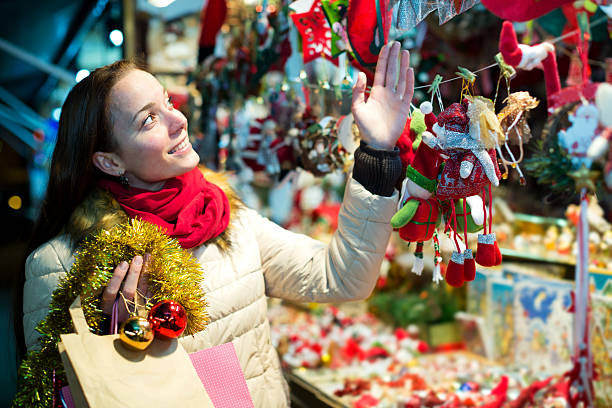 istock Female customer at the Christmas Fair 619967412