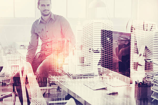 istock Young businessman at his desk. 619970500
