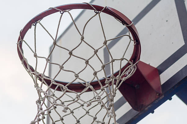 istock Basketball hoop on sky 619971360