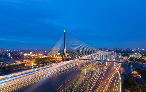 istock Beautiful Rama 8 Bridge crosses Chao Phraya the river 619971400