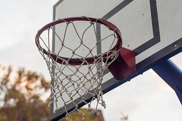 istock Basketball hoop on sky 619971420
