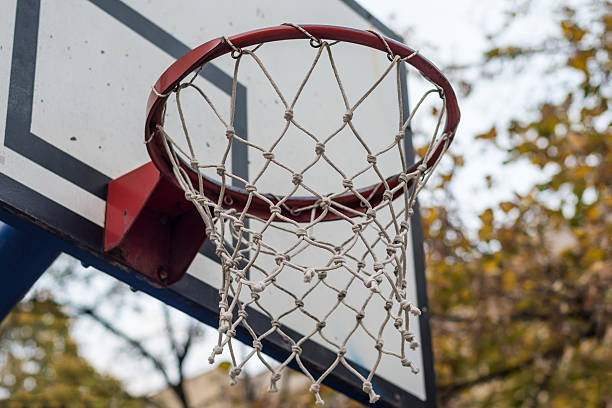 istock Basketball hoop on sky 619971480