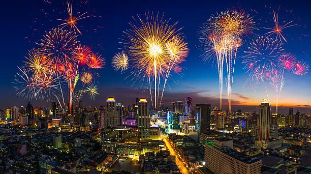 istock Beautiful firework in festival event exploding over the city 619971496