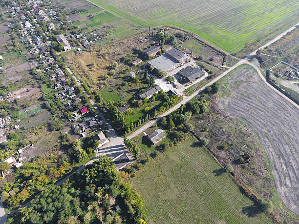 istock Abandoned and plundered ether-oil factory in the village. 619973276