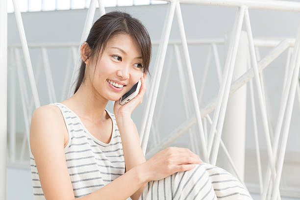 istock Woman speaking on the phone 619974886