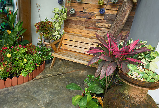 istock Wooden bench at indoor garden. 619984302