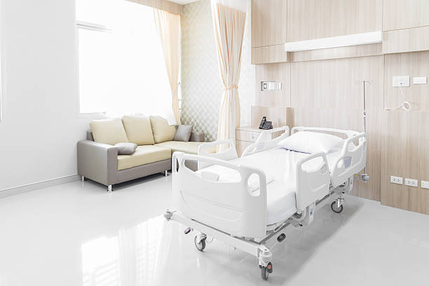 Hospital room with beds and comfortable medical equipped stock photo