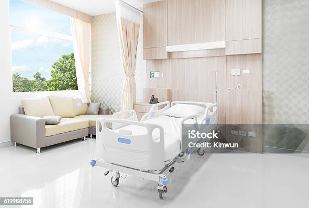 Hospital Room With Beds And Comfortable Medical Equipped Stock Photo - Download Image Now