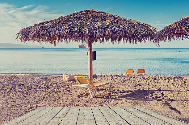istock Relaxing facilities on public beach of Eilat 619990498