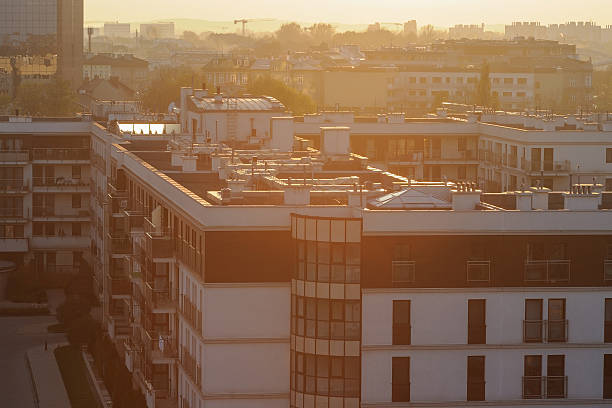 istock Background of buildings roofs at  sunset time 619991856
