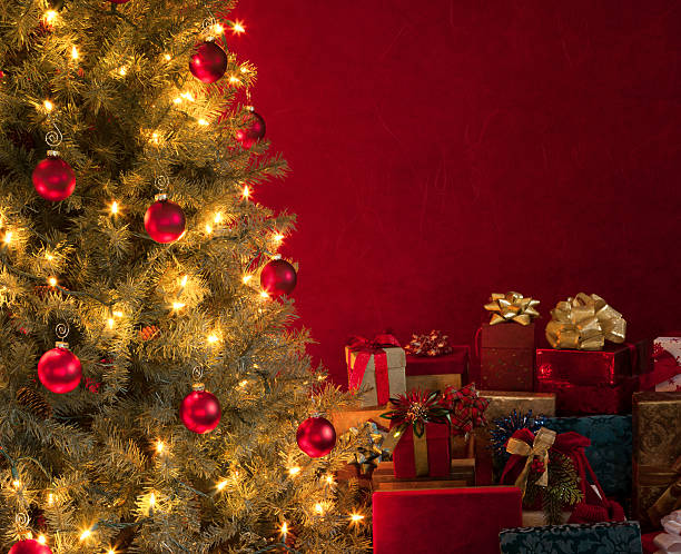 istock Christmas Tree with Gifts on Red 619992318