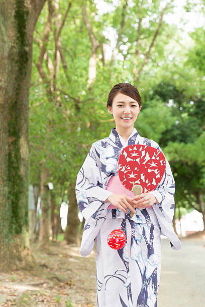 istock Woman wearing a kimono 619995256