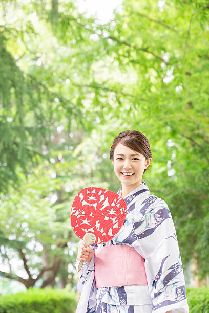 istock Woman wearing a kimono 619995572