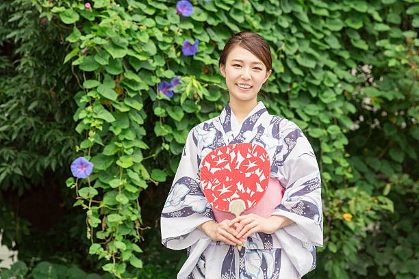 istock Woman wearing a kimono 619997692