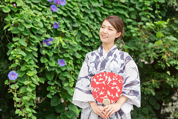 istock Woman wearing a kimono 619997850