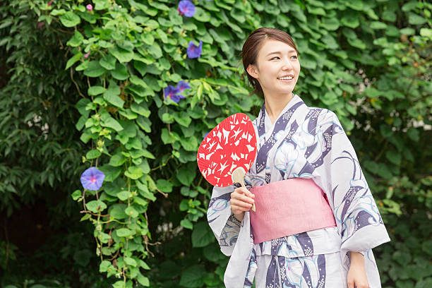 istock Woman wearing a kimono 619998260