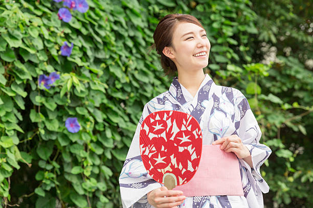 istock Woman wearing a kimono 619998646