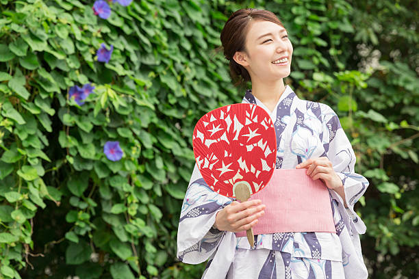 istock Woman wearing a kimono 619998698