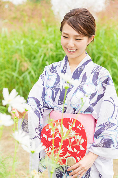 istock Woman wearing a kimono 619998848