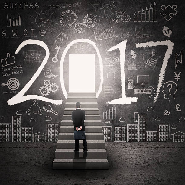 istock Man looking at door and numbers 2017 620003150