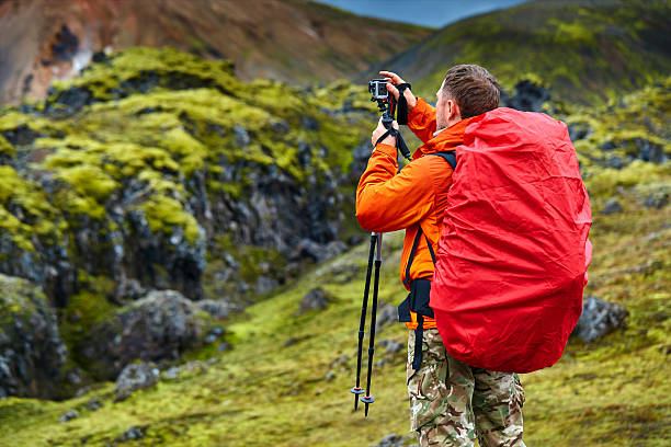 istock man hiker photographer 620003552