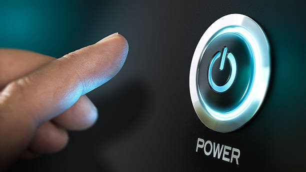 Get Started Finger about to press a power button. Hardware equipment concept. Composite between an image and a 3D background turning on or off photos stock pictures, royalty-free photos & images