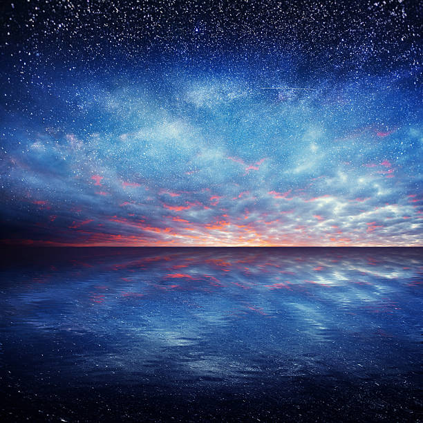 istock Fantastic starry sky over the sea 620365234