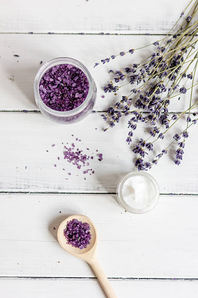 istock natural cream with lavender flowers on wooden table 620366106