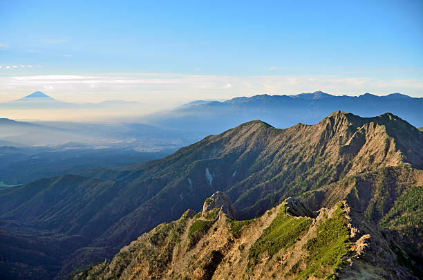 view from the Yatsugatake the view from the Yatsugatake overlooking the best 3 of altitude in Japan. Mount Fuji, Kitadake, and Ainodake. akaishi mountains stock pictures, royalty-free photos & images