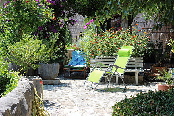 istock sun chairs in the beach garden 620367628
