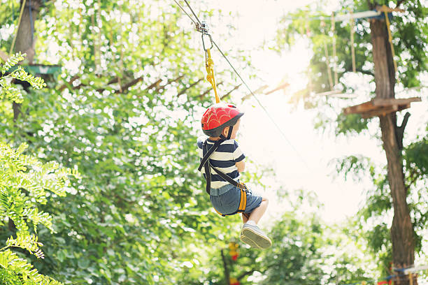 istock Kids climbing in adventure park. 620368888