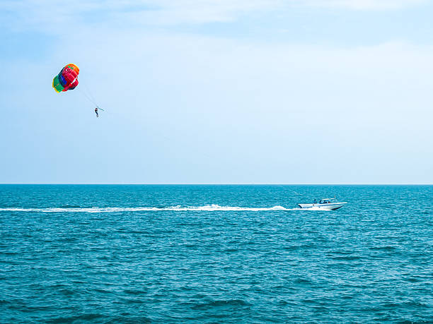 istock Parasailing against a blue sky and cloud 620375350