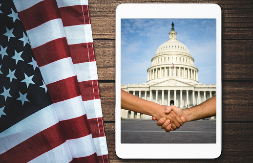 american flag on wood with tablet