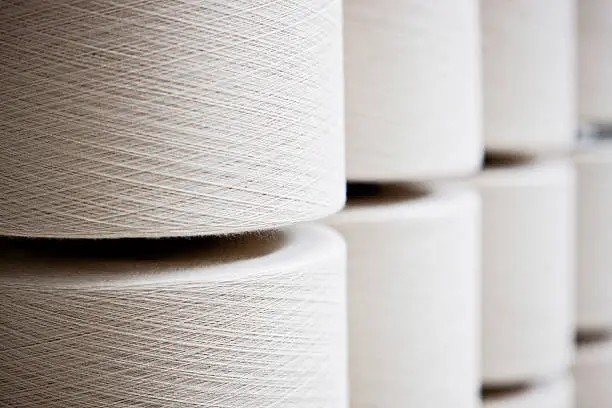 Textile thread spools white color.