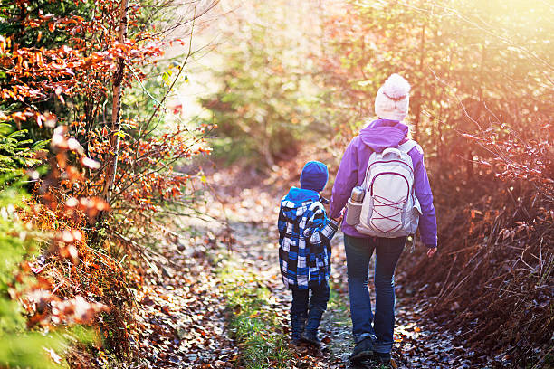 istock Mother and son hiking in autumn 620379668