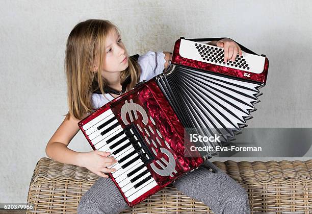 Girl Playing An Accordion Stock Photo - Download Image Now - Accordion - Instrument, Child, Accordionist