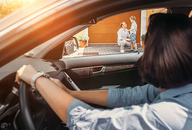 istock Mother waits her son in auto 620380676