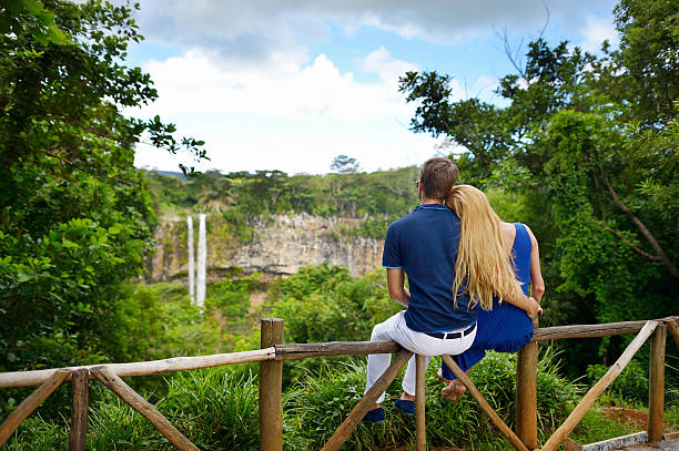 Young couple enjoying a view on Chamarel falls stock photo