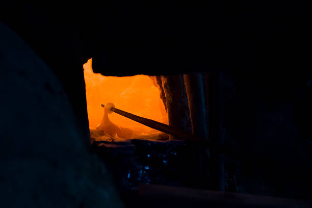 istock Melted glass in furnace 620386722