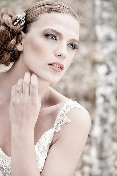 istock Beautiful young bride outdoors 620388200